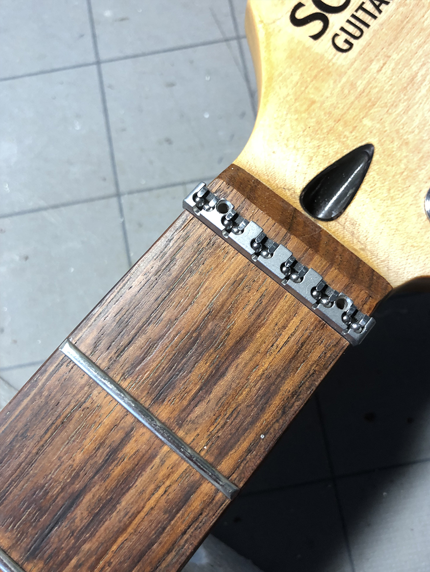 Wilkinson Roller Nut attachment Earthbound Guitar Shop